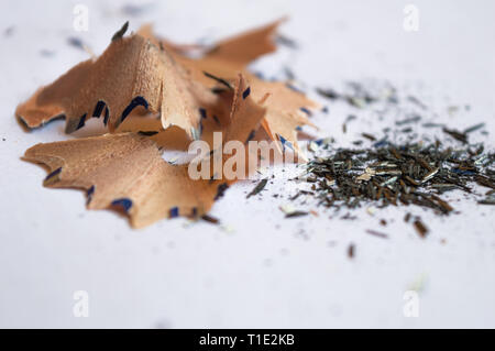 Close up pencil peels and black graphite lead waste on a white background copy space Stock Photo