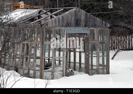 Skeleton of a handmade greenhouse, winter scene Stock Photo