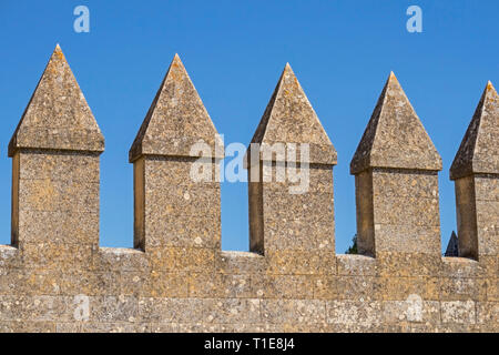 Crenellations on a castle wall.  Almodovar del Rio, Cordoba Province, Spain.  Almodovar castle. Stock Photo