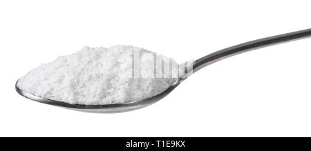 side view of teaspoon with grained Rock Salt isolated on white ...