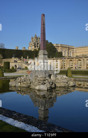 Blenheim Palace, birthplace of Sir Winston Churchill, Woodstock,. Oxfordshire with the ornamental garden and fountain in the foreground Stock Photo