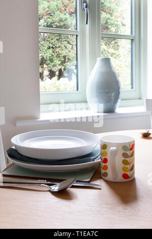 Dining table set on a table in Gloucester, England Stock Photo