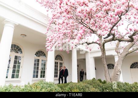 Washington DC, USA. 25th Mar 2019. U.S. President Donald Trump walks with Israeli Prime Minister Benjamin Netanyahu through the West Wing Colonnade of the White House March 25, 2019 in Washington, D.C. Credit: Planetpix/Alamy Live News Stock Photo