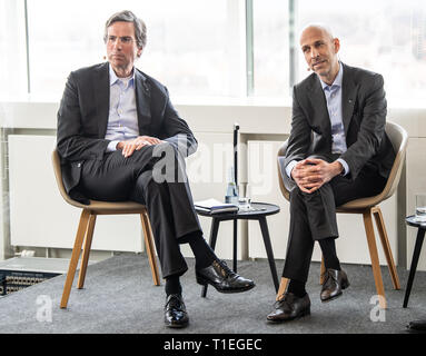 26 March 2019, Baden-Wuerttemberg, Ditzingen: Peter Leibinger (r), Chief Technology Officer and Deputy Managing Director, and Mathias Kammüller, Chief Digital Officer and Member of the Management Board, will participate in the press conference of the machine manufacturer Trumpf. At the INTECH in-house exhibition, Trumpf will be presenting innovations in the field of 3D printing and artificial intelligence. Photo: Fabian Sommer/dpa Stock Photo