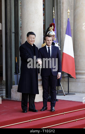 Paris, France. 25th Mar, 2019. French President Emmanuel Macron greets ...