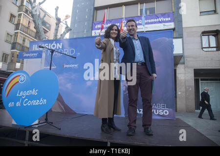 Leganes, Spain. 25th Mar, 2019. Isabel Diaz Ayuso, candidate of the Popular Party to the Community of Madrid with the candidate for mayor of Leganes and Miguel Angel Recuenco, are seen before the rally.Candidate of the People's Party (PP) for the regional presidency of the Community of Madrid Isabel Diaz Ayuso, visits the streets, shops of Leganes and holds a rally for citizens within her pre-campaign electoral agenda. During the visit and the meeting, David Lopez participated, number two of Diaz Ayuso for the upcoming elections to the Community of Madrid and the candidate for the People's Stock Photo