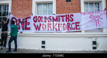 London, UK. 26 March, 2019. Security Officers and supporters at Goldsmiths College in South London marched through the campus where they addresses students in canteens and lecture theatres before taking to the streets to continue the campaign for jobs to be brought ‘in house' so that terms and conditions match those of staff directly employed by the college. David Rowe / Alamy Live News.