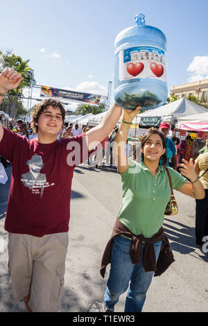 Miami Beach Florida,Flamingo Park,Valentine's Day Carnival,popcorn,popper, machine,Hispanic Black,boy boys,male kid kids child children girl  girls,fema Stock Photo - Alamy