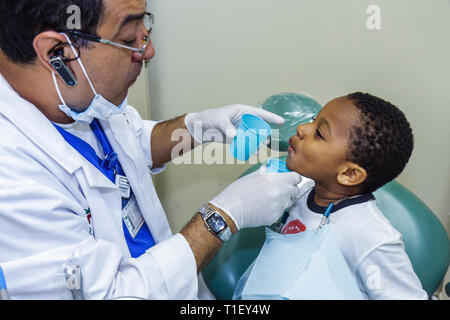 Miami Florida,Liberty City,Jessie Trice Community Health Center,oral health,fair,free care,exam,volunteer volunteers volunteering work worker workers, Stock Photo