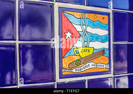 Miami Florida,Little Havana,Calle Ocho,Maximo Gomez Domino Park,tile,mosaic,colorful,blue,yellow,red,hand painted,Cuban flag,cigar,coffee cup,little H Stock Photo