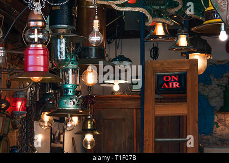 Retro light lamps with Edison light bulb on a grunge background, flea market Stock Photo