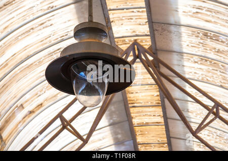 Retro lamp on a grunge background, flea market ceiling Stock Photo