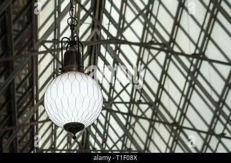 Retro lamp on a grunge background, flea market ceiling Stock Photo