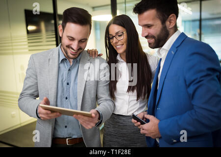 Picture of businesspeople using digital tablet in office Stock Photo