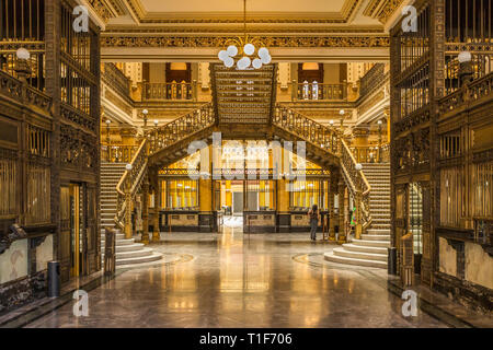 Mexico City main post office was built in 1907 and is comprised of many architectural styles including extensive use of ornate polished brass. Stock Photo