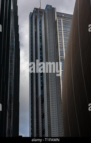 The mast-topped Heron Tower and curved wall of the 'Can of Ham' building, 70 St Mary Axe. Stock Photo