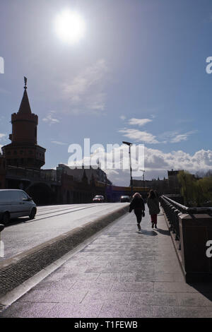 Pedestrians walking over the Oberbaum bridge in berlin Germany Stock Photo