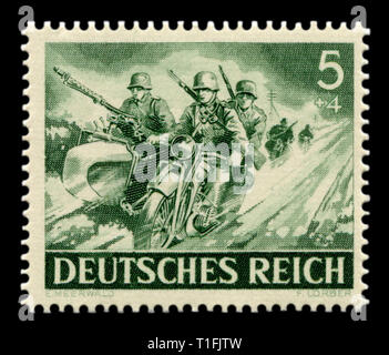 German historical stamp: Military motorcycle units of the Wehrmacht. Motorbike with sidecar with mg-34 machine gun, Eastern front, memorial day 1943 Stock Photo