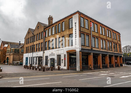 Guildford, United Kingdom - March 23, 2019: Street view of the Rodboro buildings Wetherspoon pubs in the medieval city of Guildford, England. Stock Photo