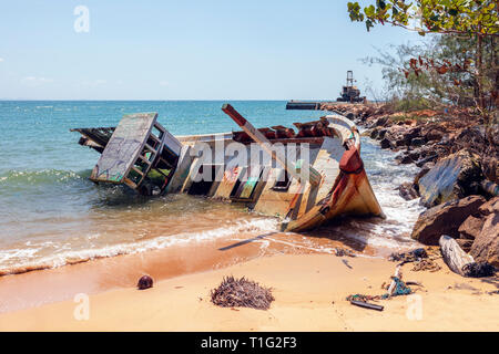 Wrecked fishing boat on the Bai Vang Ban public beach in the Gulf of Thailand, Phu Quoc, Vietnam, Asia Stock Photo
