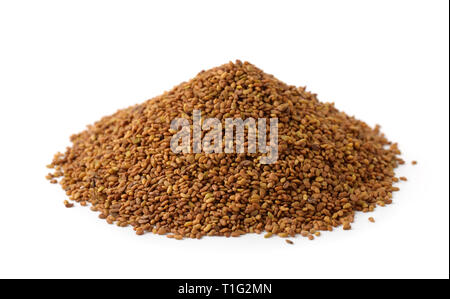 Pile of organic alfalfa seeds isolated on white Stock Photo