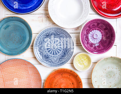 Set of different empty plates Stock Photo