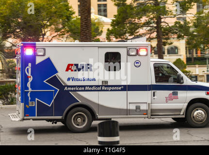 LAS VEGAS, NEVADA, USA - FEBRUARY 2019: Ambulance driving down a Las Vegas street on an emergency call. Stock Photo