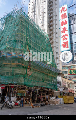 Bamboo Scaffolding n Building, Kowloon, Hong Kong Stock Photo