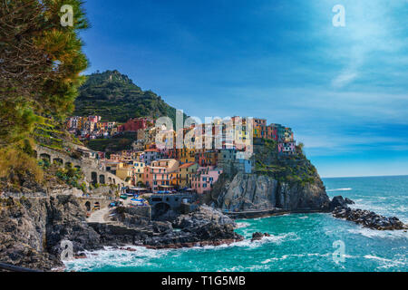 Beautiful scenery in Manarola town, Cinque Terre national park, Liguria, Italy. It is one of five famous colorful fisherman villages in Europe, suspen Stock Photo