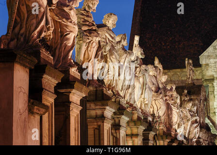 Baroque 12 Apostles statues in front of kosciol Sw Piotra i Sw Pawla (Saints Peter and Paul Church) built 1597 to 1619 by Giovanni Maria Bernardoni in Stock Photo