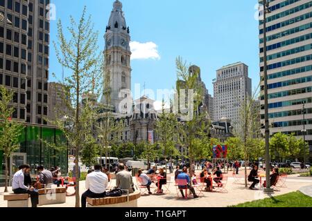 Love Park with Robert Indiana Sculpture and people on plaza, Benjamin Franklin Parkway, Philadelphia, Pennsylvania. Stock Photo