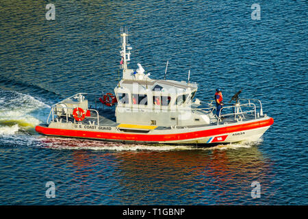 Sheriff boat meets with the US Coast Guard ship in Tampa Florida downtown waters on the Hillsbourough River for law enforcement exercise Stock Photo