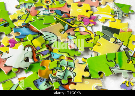 colored puzzles closeup. children's play puzzles. Game for the development of the child. Puzzles Stock Photo