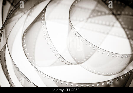 Old film camera for celluloid movie isolated over white background