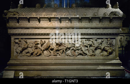 Sarcophagus of Alexander the Great (late 4th century BC). It was found in the royal necropolis of Sidon (Sayda). Pentelic marble. High relief of one of the lateral sides depicting a battle between Greeks and Persians (with long pants, anaxyrides). On the left, Alexander the Great, with the skin of the head of Lion of Nemesis, chasing a Persian soldier. Archaeological Museum. Istanbul. Turkey. Stock Photo