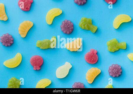 Fruit jelly candies on colorful background. Stock Photo