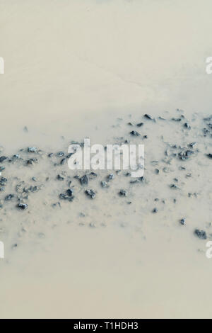 Muddy puddle in a farm track Stock Photo - Alamy