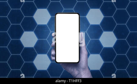 Phone mockup surrounded with hexagon shape network with free cells. Tehnology mobile network concept. Stock Photo