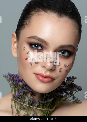 Portrait of young woman with beautiful makeup Stock Photo