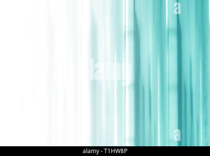 Elegant striped turquoise background pattern fading into white space Stock Photo