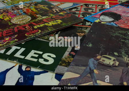 Naples, Italy - December 26 2018. Cover of the famous Beatles Abbey Road album with a turntable in the foreground. Stock Photo