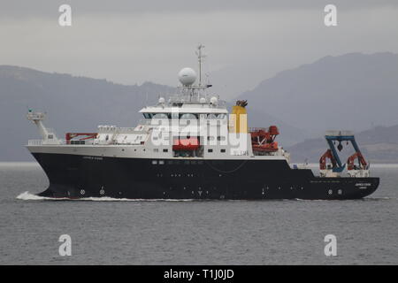 RRS James Cook, a research vessel operated by the Natural Environment Research Council, on an outbound journey after a visit to the Firth of Clyde. Stock Photo