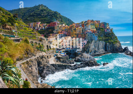 Beautiful scenery in Manarola town, Cinque Terre national park, Liguria, Italy. It is one of five famous colorful fisherman villages in Europe, suspen Stock Photo