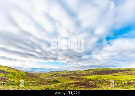 Reykjadalur, Iceland Hveragerdi Hot Springs in autumn summer morning day on golden circle landscape with nobody trail hiking and cloudy skyscape Stock Photo