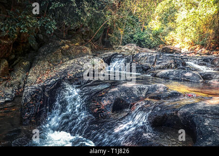 This unique photo shows the wild jungle waterfall and stunning nature also called Palau Waterfall Hua Hin in Thailand Stock Photo