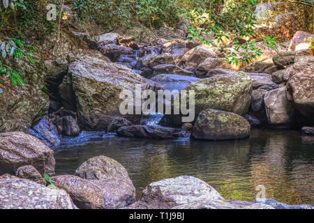 This unique photo shows the wild jungle waterfall and stunning nature also called Palau Waterfall Hua Hin in Thailand Stock Photo