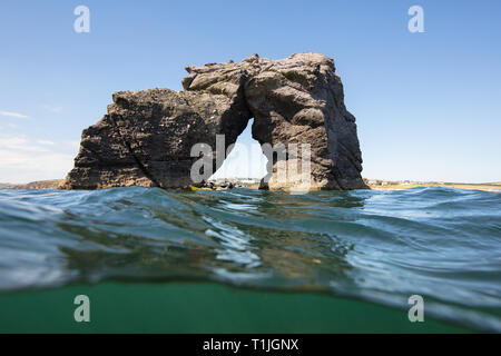 This beautiful rock stands out at sea guarding South Milton Sands, Thurlestone Stock Photo