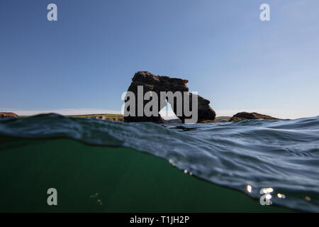 This beautiful rock stands out at sea guarding South Milton Sands, Thurlestone Stock Photo