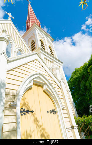 Architectural detail on striking pink church bell tower in Blenhiem New Zealand Stock Photo