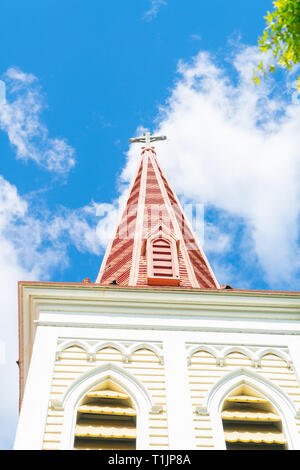 Architectural detail on striking pink church bell tower in Blenhiem New Zealand
